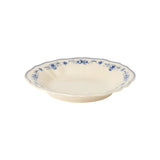 Ceramic bowl with blue floral pattern on a white background