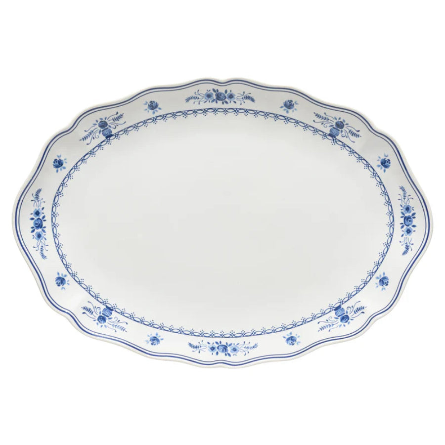 White ceramic platter with blue floral patterns on a white background