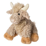 Plush toy cow on a white background