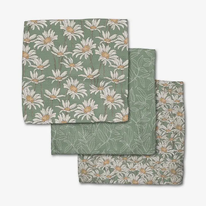 Set of three fabric swatches with floral patterns on a white background