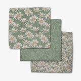 Set of three fabric swatches with floral patterns on a white background