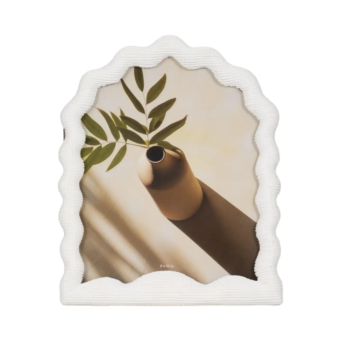Decorative wall art with a bird and leaves design on a white background
