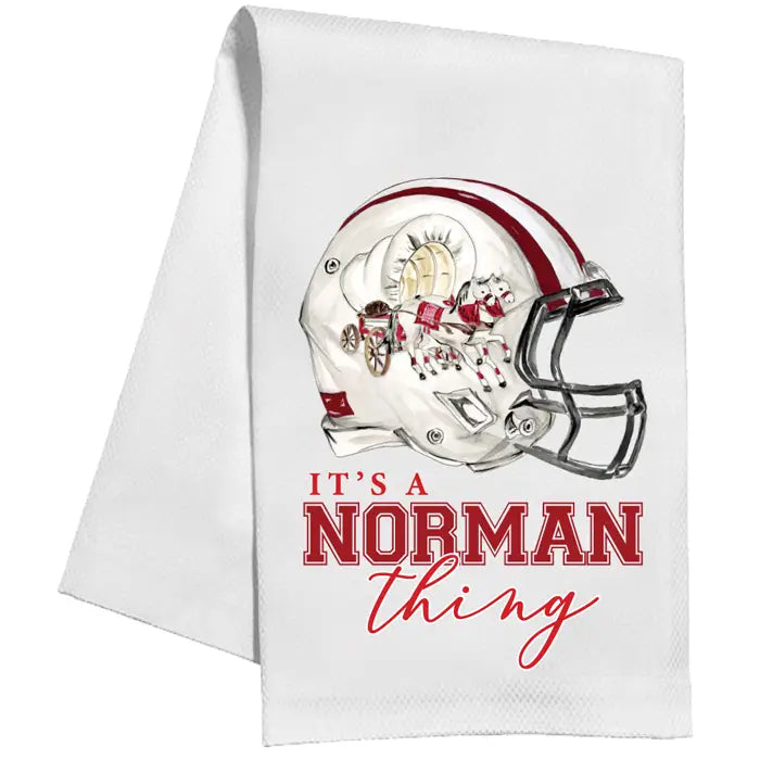 White towel with football helmet graphic and 'It's a Norman thing' text on a white background