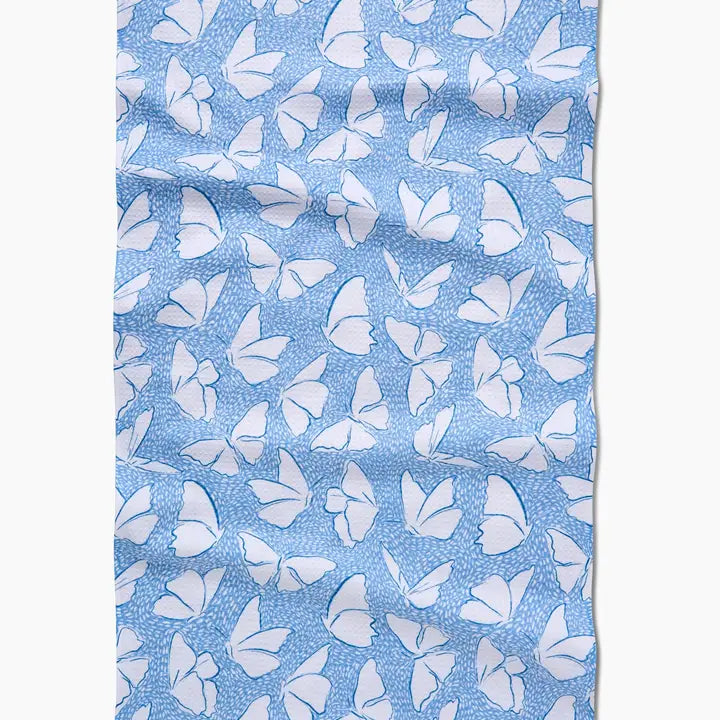 Blue fabric with white butterfly pattern