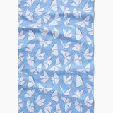 Blue fabric with white butterfly pattern