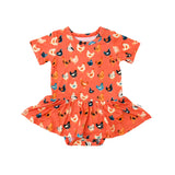 Children's outfit with chicken pattern on a white background
