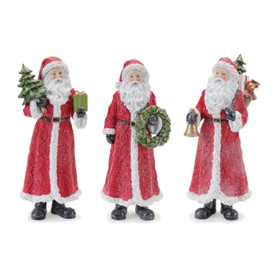 Three Santa Claus figurines with Christmas accessories on a white background