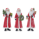 Three Santa Claus figurines with Christmas accessories on a white background