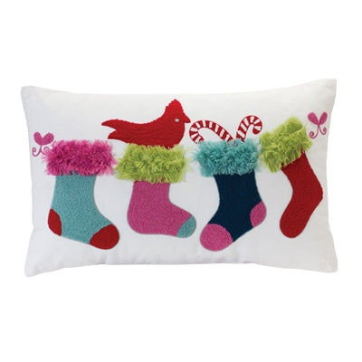 Decorative pillow with colorful stockings and a cardinal on a white background