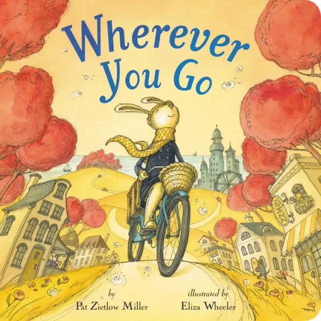 Children's book cover titled "Wherever You Go" showing a rabbit riding a bicycle through a whimsical illustrated town with red trees and yellow hills. Text at the bottom reads "by Pat Zietlow Miller" and "illustrated by Eliza Wheeler.