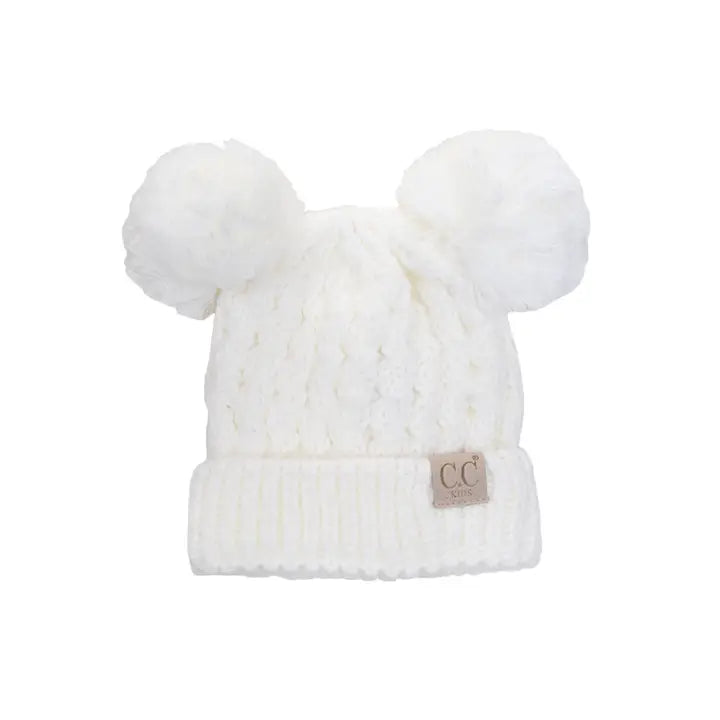 White knit baby hat with pom-poms on a white background