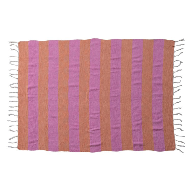 Striped throw blanket with pink and orange stripes on a white background