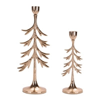 Two rose gold tree-shaped candle holders on a white background