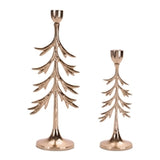 Two rose gold tree-shaped candle holders on a white background