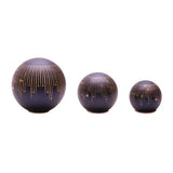 Three decorative spherical vases with gold accents on a white background