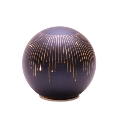 Decorative spherical object with gold accents on a white background