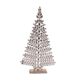 Decorative Christmas tree made of metallic leaves on a white background