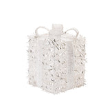 Decorative white textured box with handles on a white background