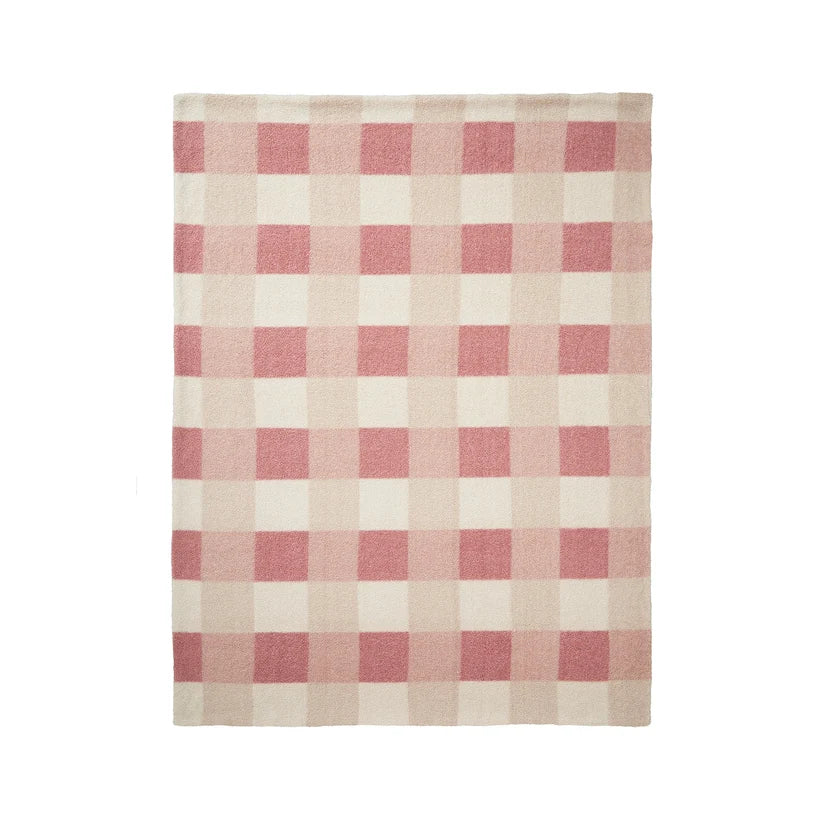 A rectangular woven textile with a pink and cream gingham check pattern, shown flat against a plain white background.