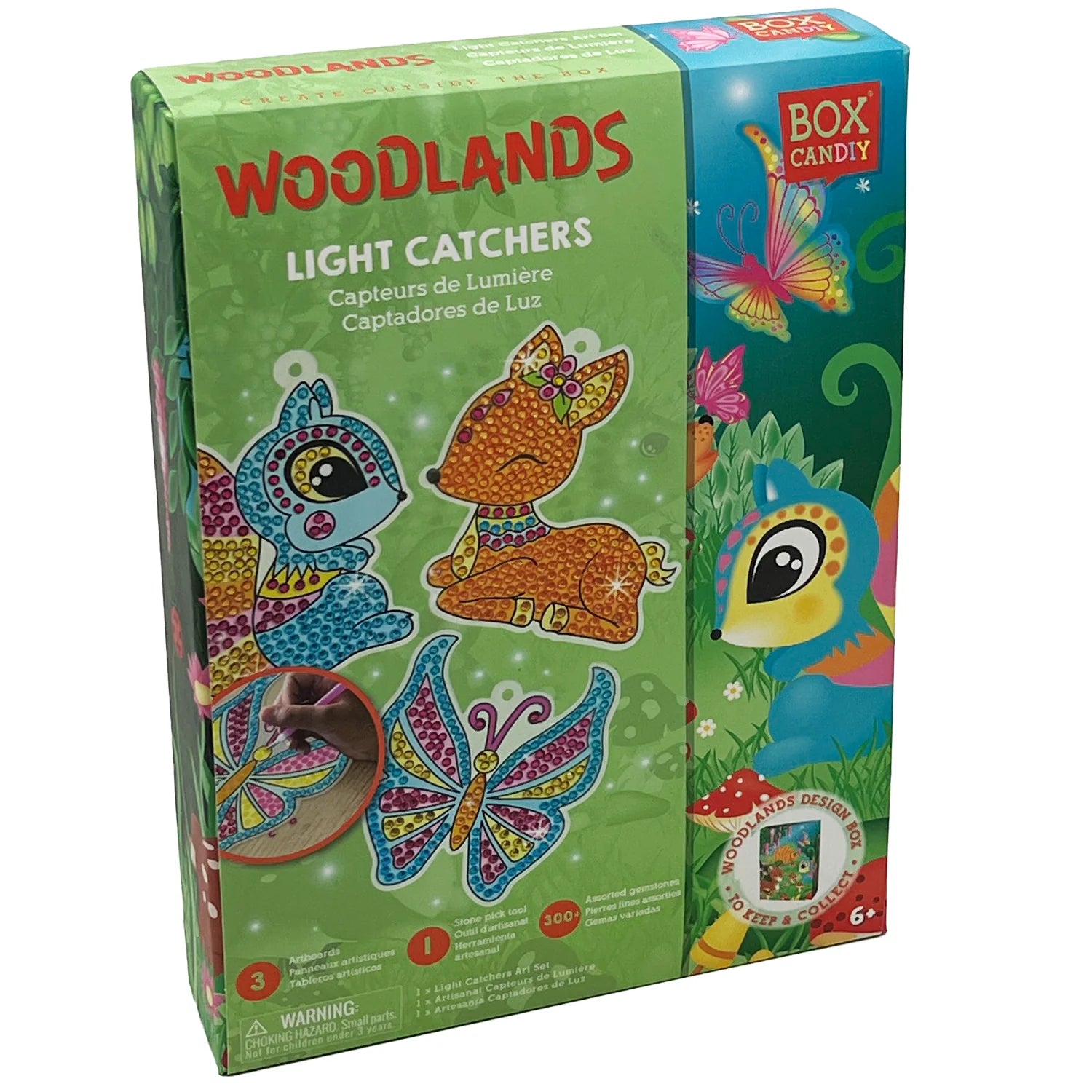A boxed Woodlands Diamond Art Set with colorful illustrations of diamond art designs on the packaging, including animals like birds and butterflies.
