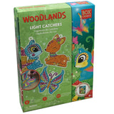 A boxed Woodlands Diamond Art Set with colorful illustrations of diamond art designs on the packaging, including animals like birds and butterflies.