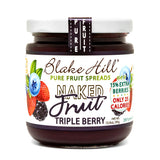 Jar of Blake Hill Naked Fruit Triple Berry spread on a white background