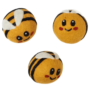 Three bee-themed plush toys on a white background