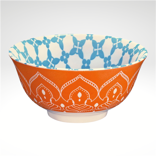 Bowl with orange and blue patterned interior on a white background