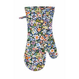 A single oven mitt with a dense, colorful floral print on a dark navy background, featuring a small matching fabric tie at the top, shown against a plain white background.