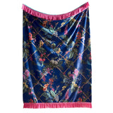 Floral patterned fabric with pink trim on a white background