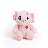 Pink plush toy with black eyes and a red heart on a white background