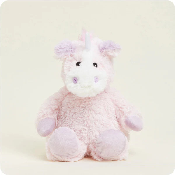 Plush unicorn toy on a light background