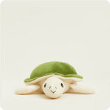 Plush turtle toy with green shell on a white background