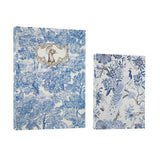 Two decorative boxes with blue and white toile-style prints, one featuring a peacock and floral motif and the other a bird framed by ornate detailing, shown on a white background.