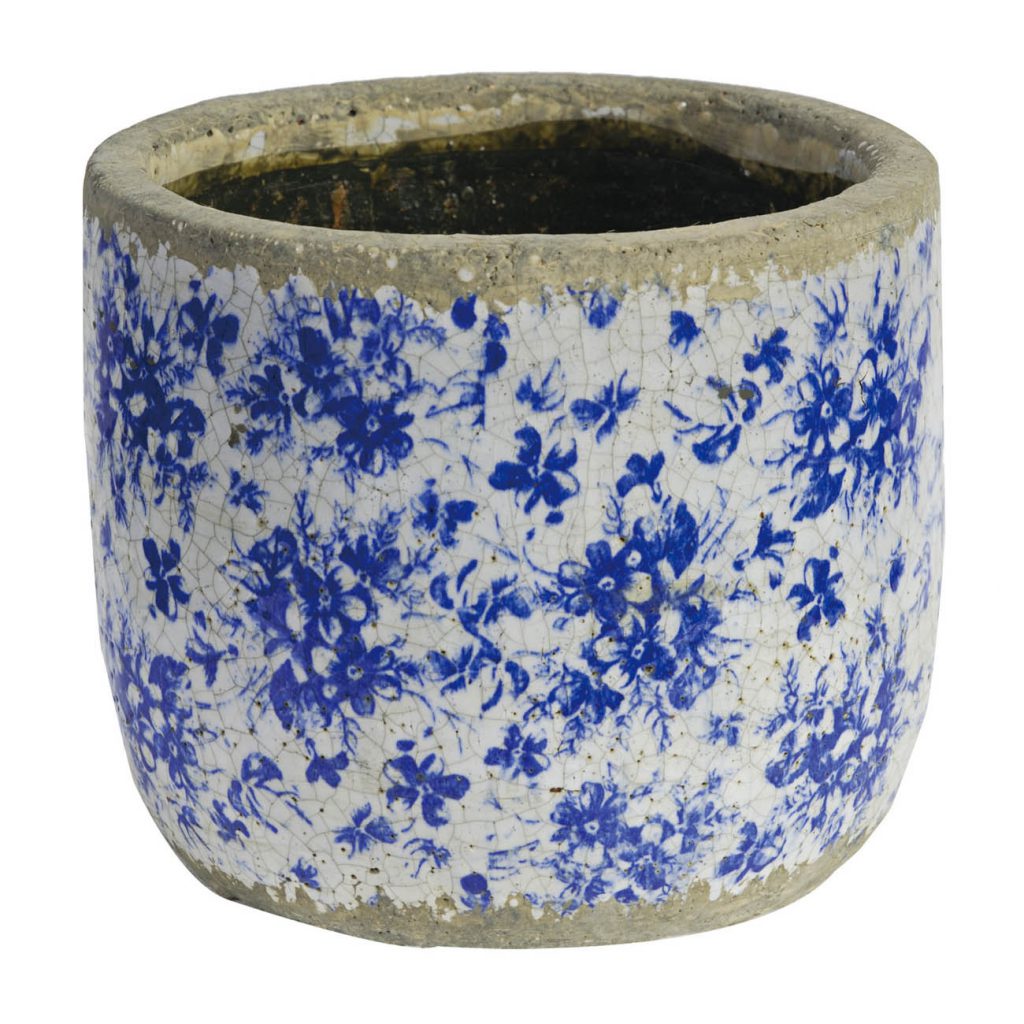 A small cylindrical ceramic planter pot with a blue floral pattern on a white glaze, featuring a rustic, unglazed clay rim and base.