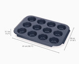 Muffin tray with dimensions labeled on a white background