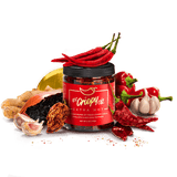 Jar of 'Red Gripe' chili paste with chili peppers, garlic, and a banana on a transparent background
