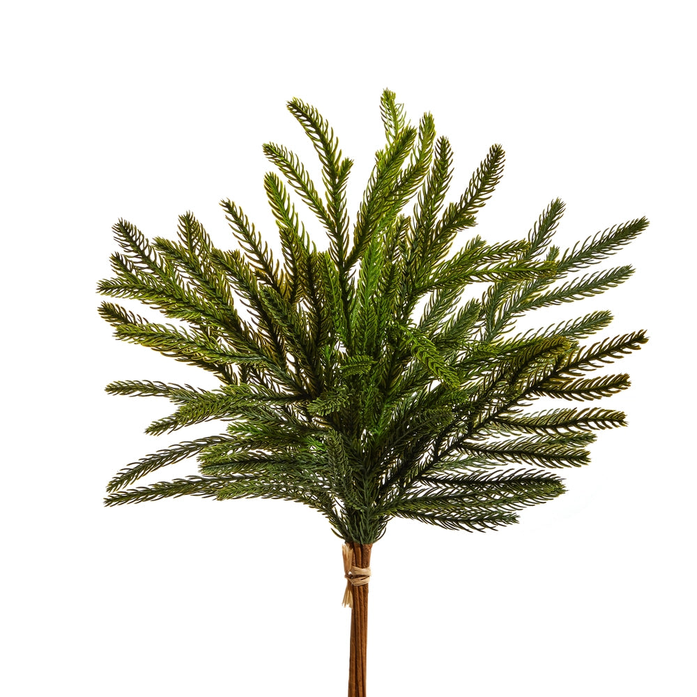 Artificial pine tree branch on a white background