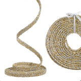A roll of textured, glittery ribbon or trim shown partly unrolled, with a coiled section on the right tied with a white bow, on a plain white background.