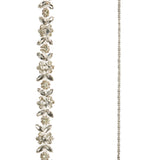 Delicate silver necklace with floral design on a white background
