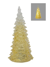 A clear, textured Christmas tree-shaped light or ornament shown on a white background, with a small inset image in the top right showing the same item illuminated in warm yellow-gold.