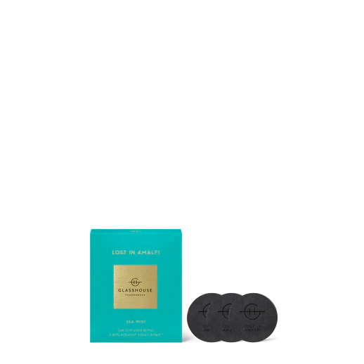 Tea packaging with a teal box and black tea bags on a white background