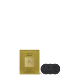 Packaging of 'Kyoto in Bloom' by Glasshouse Fragrances with two black discs on a white background.