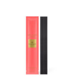 Pink packaging with gold label and black sticks on a white background