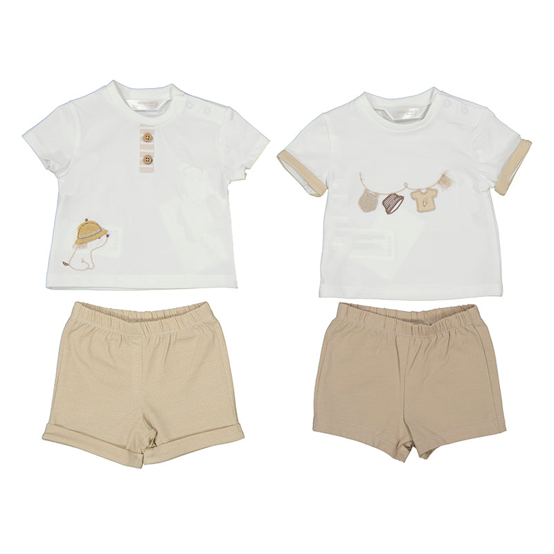 Two children's outfits, one with a white top and beige shorts and another with a beige top and white shorts, both featuring cartoon character appliques.