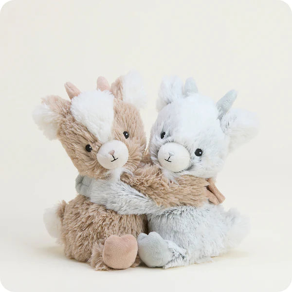 Two plush toys, one brown and one gray, sitting together on a white background