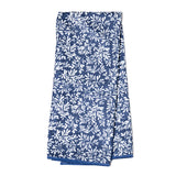 Blue and white patterned towel on a white background