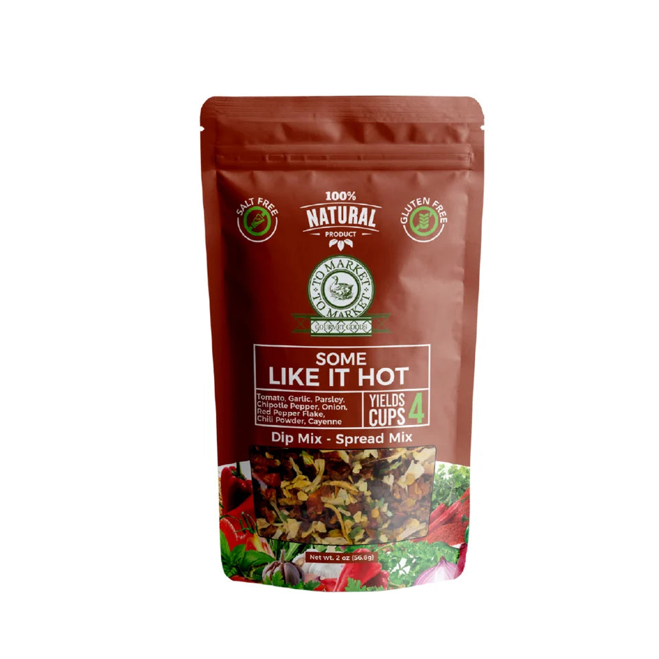 A stand-up pouch of Plant Based Nutrition 'Some Like It Hot' Dip Mix - Spread Mix, featuring a dark reddish-brown background with green and white text and a colorful image of the mixed vegetables at the bottom.