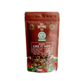 A stand-up pouch of Plant Based Nutrition 'Some Like It Hot' Dip Mix - Spread Mix, featuring a dark reddish-brown background with green and white text and a colorful image of the mixed vegetables at the bottom.