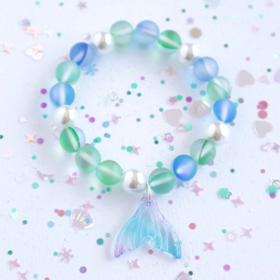 Mermaid-themed bracelet with blue and green beads on a light background
